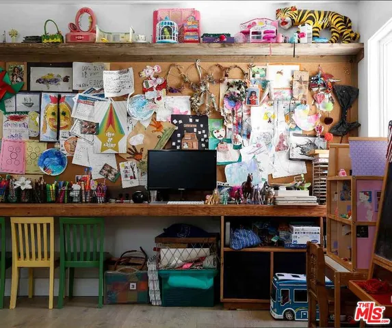 a view of a water fountain in front of a house