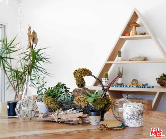 a vase of flowers sitting on a table