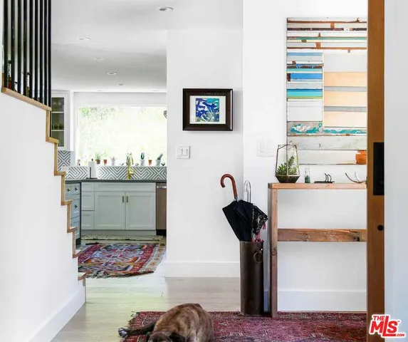 a view of workspace with furniture and window
