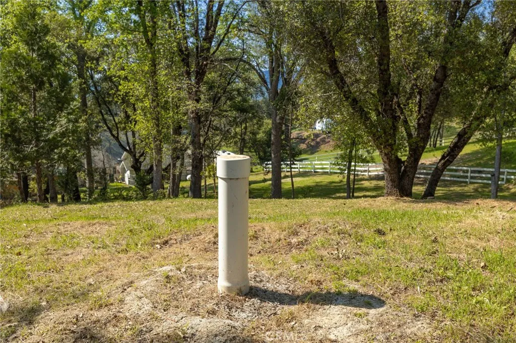 1 Oak Oakhurst, CA 93644 - Photo 43 of 48 a view of a wooden house with a yard