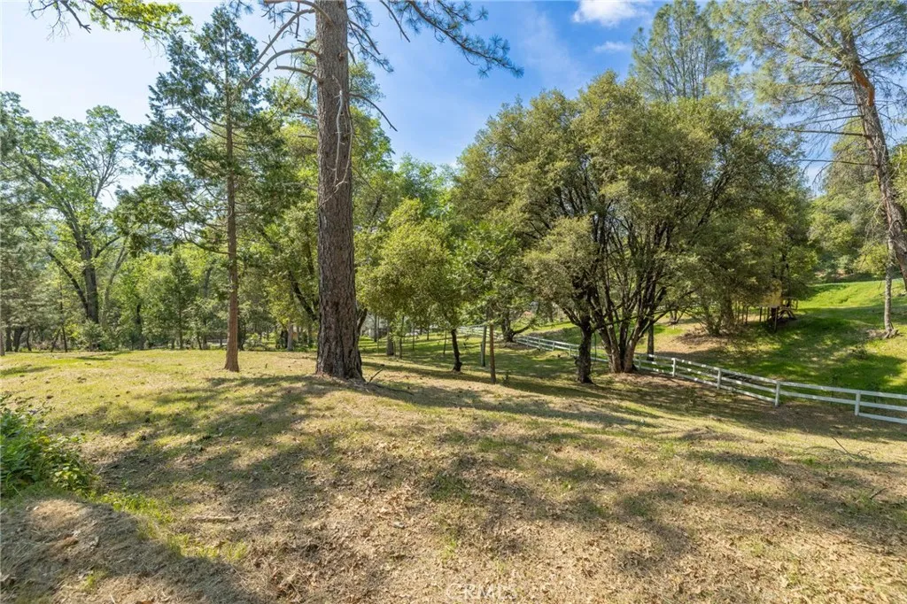 1 Oak Oakhurst, CA 93644 - Photo 10 of 48 a view of a field with trees in the background