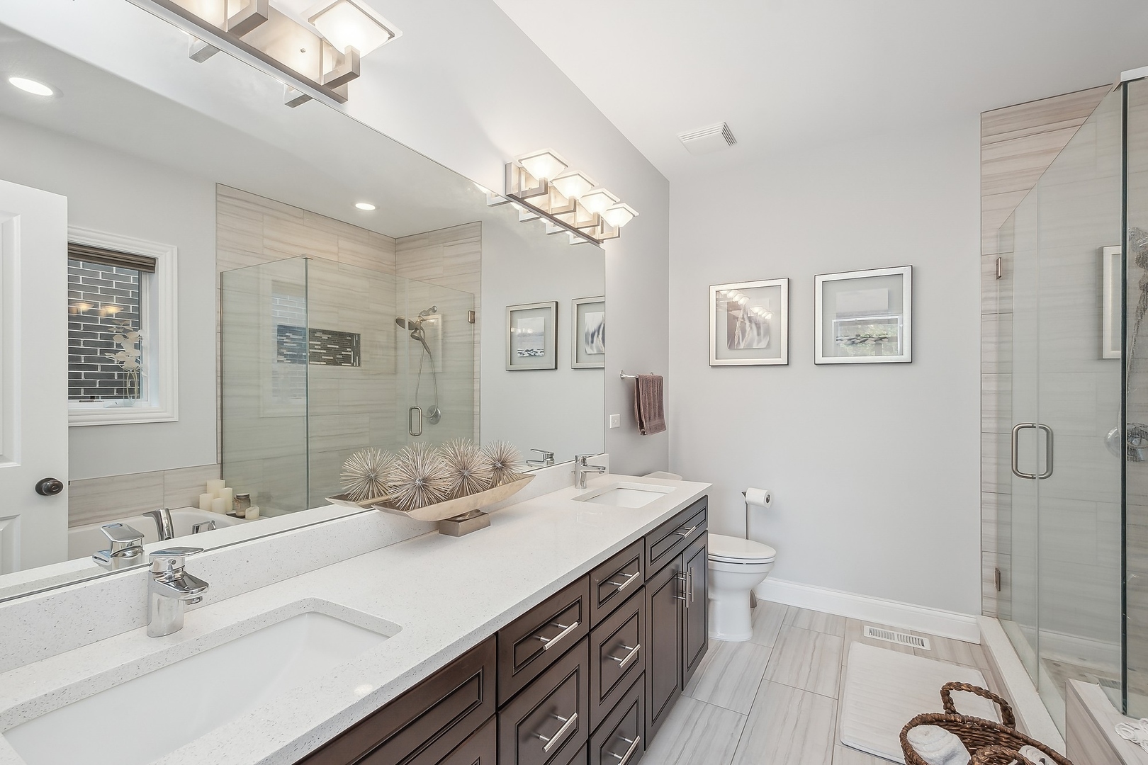 3301 South Racine Avenue Chicago, IL 60608 - Photo 12 of 32 a bathroom with a double vanity sink mirror and shower