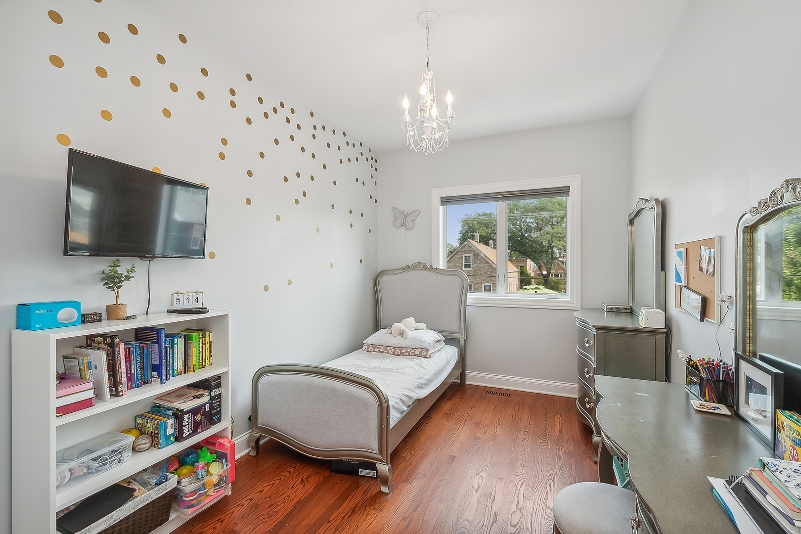 3301 South Racine Avenue Chicago, IL 60608 - Photo 14 of 32 a bedroom with furniture and a flat screen tv