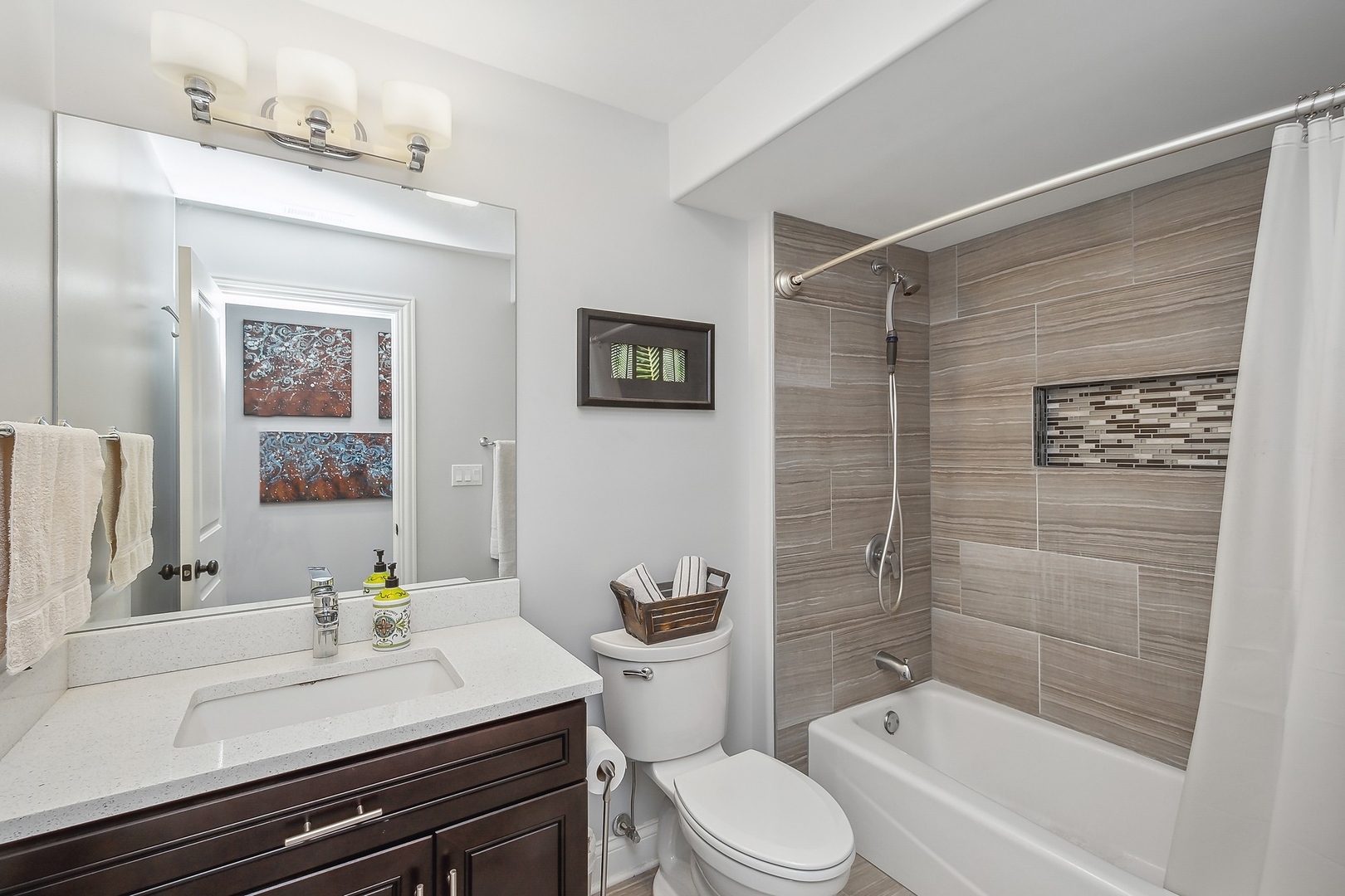 3301 South Racine Avenue Chicago, IL 60608 - Photo 18 of 32 a bathroom with a sink a toilet and shower