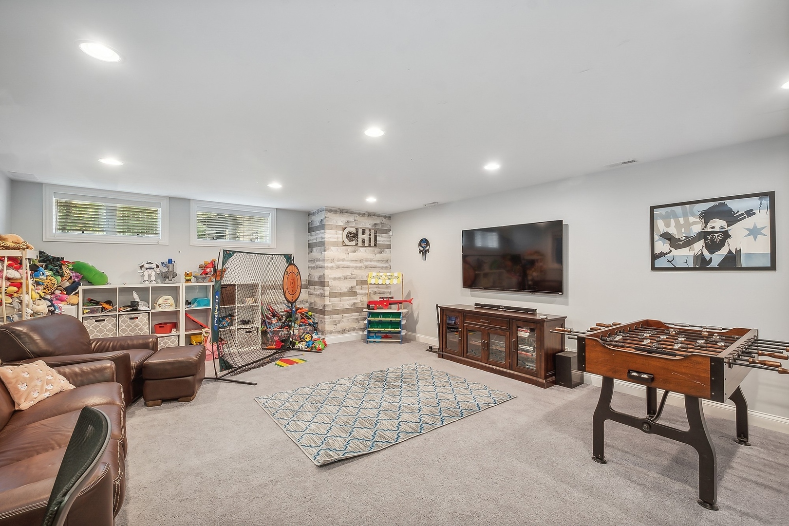 3301 South Racine Avenue Chicago, IL 60608 - Photo 19 of 32 a living room with furniture and a flat screen tv