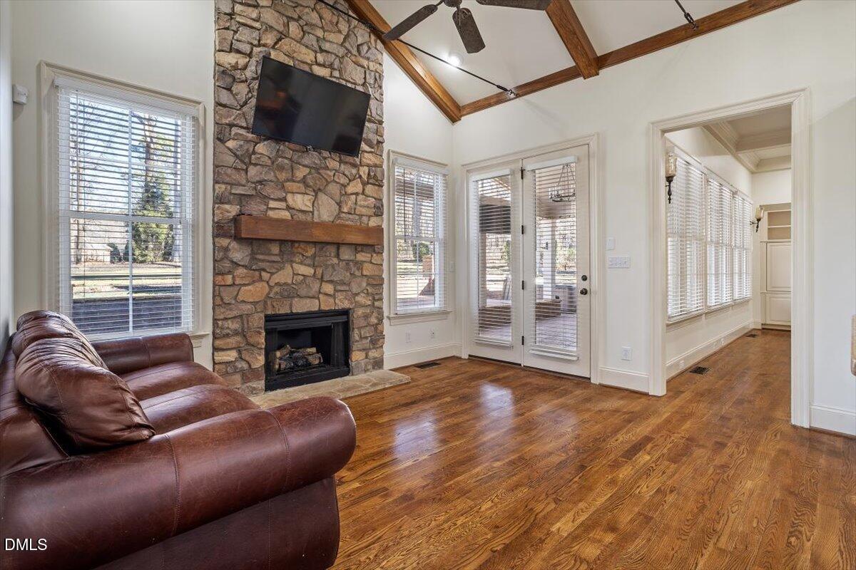 12820 River Dance Drive Raleigh, NC 27613 - Photo 17 of 86 a living room with furniture and a fireplace