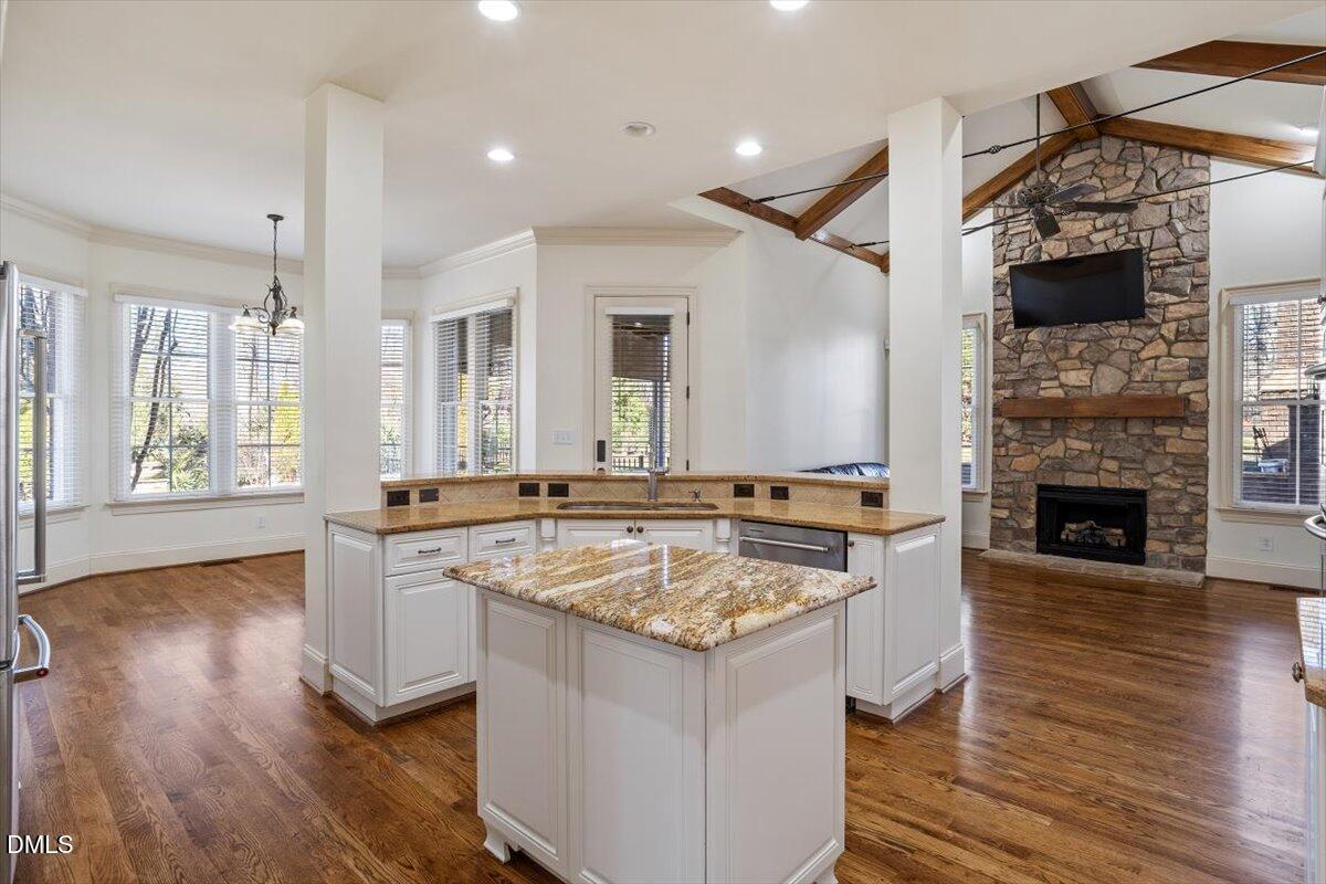 12820 River Dance Drive Raleigh, NC 27613 - Photo 21 of 86 a kitchen with a stove and a wooden floors
