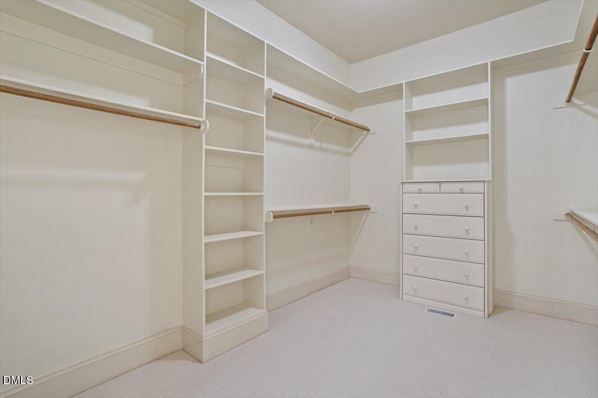 12820 River Dance Drive Raleigh, NC 27613 - Photo 35 of 86 a view of an empty walk in closet