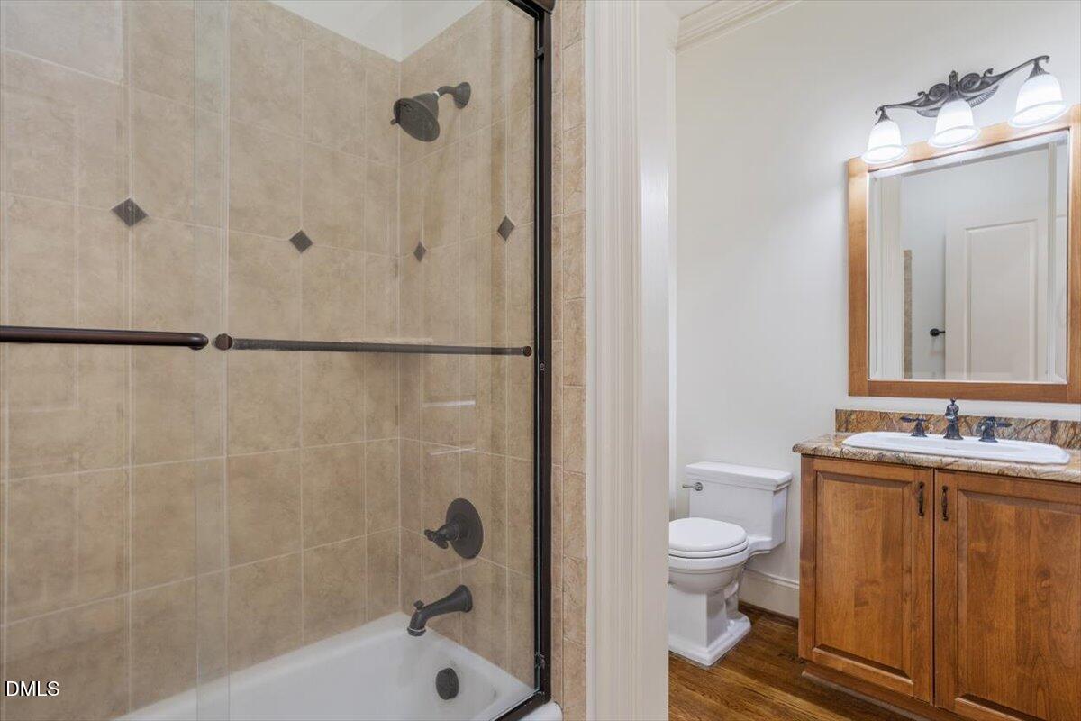12820 River Dance Drive Raleigh, NC 27613 - Photo 36 of 86 a bathroom with a sink toilet and shower