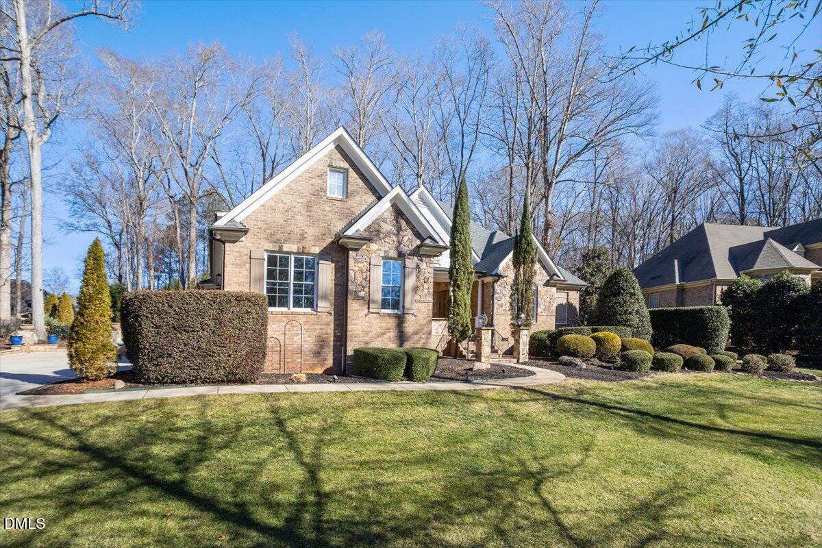 12820 River Dance Drive Raleigh, NC 27613 - Photo 3 of 86 a view of a house with snow on the side of it