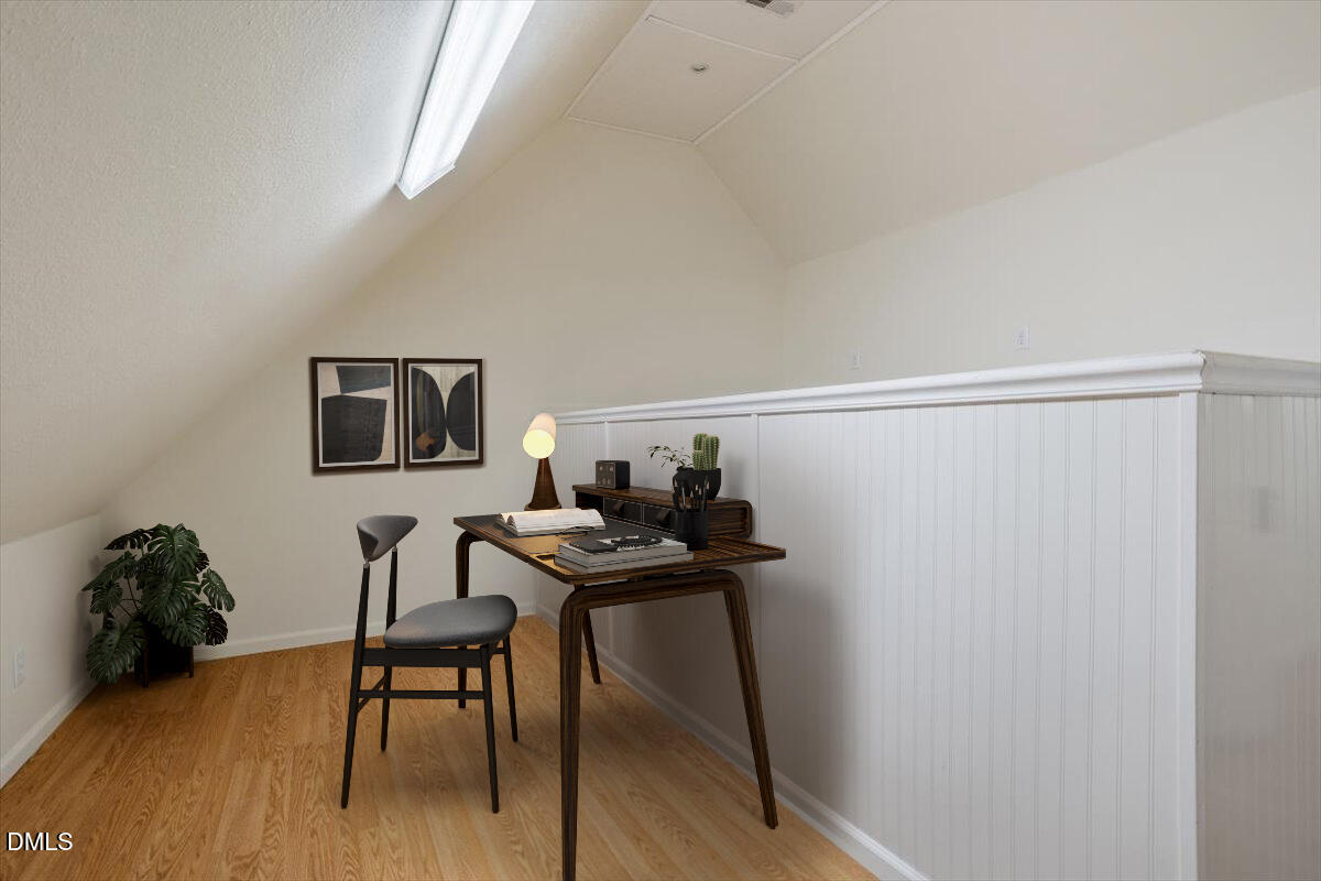 12820 River Dance Drive Raleigh, NC 27613 - Photo 46 of 86 a view of a workspace with furniture and wooden floor