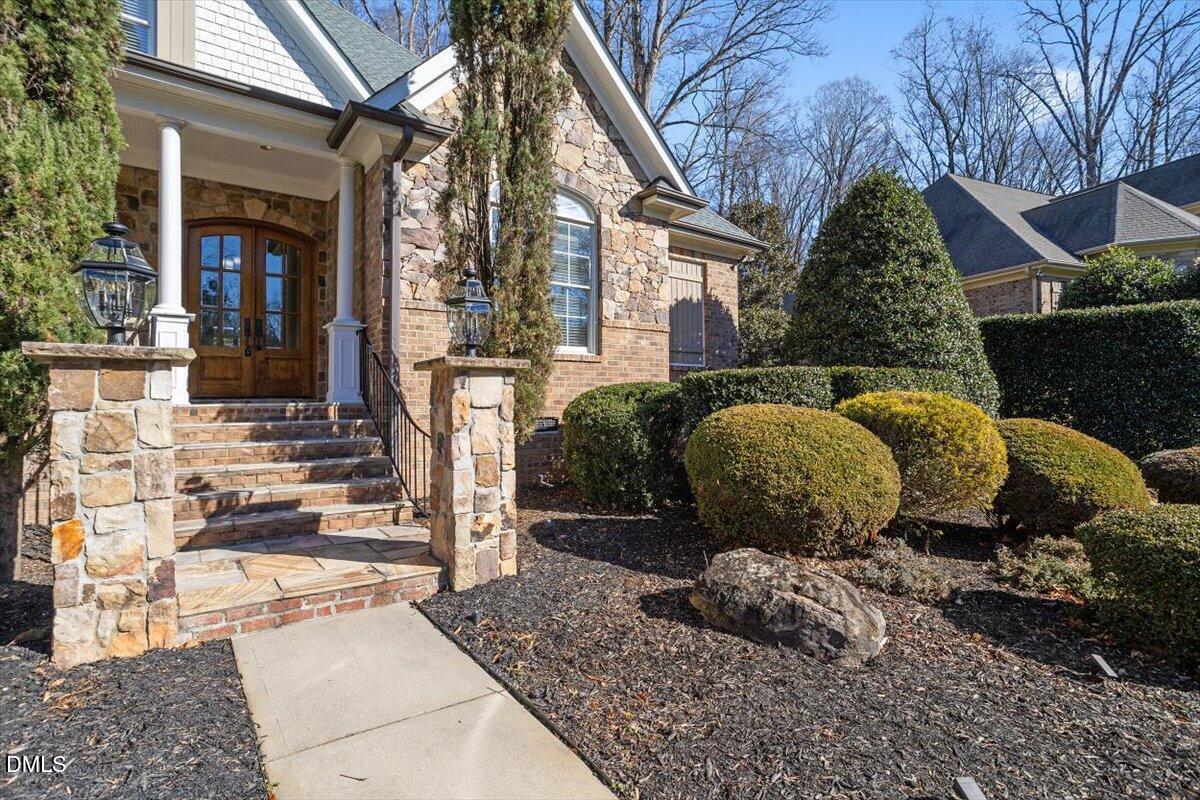 12820 River Dance Drive Raleigh, NC 27613 - Photo 4 of 86 a backyard of a house with outdoor seating