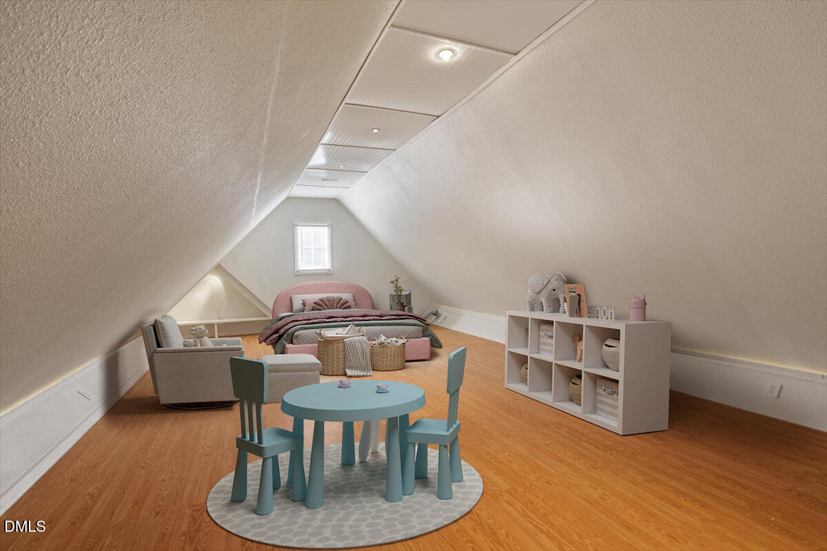 12820 River Dance Drive Raleigh, NC 27613 - Photo 55 of 86 a view of a dining room with furniture a rug and wooden floor