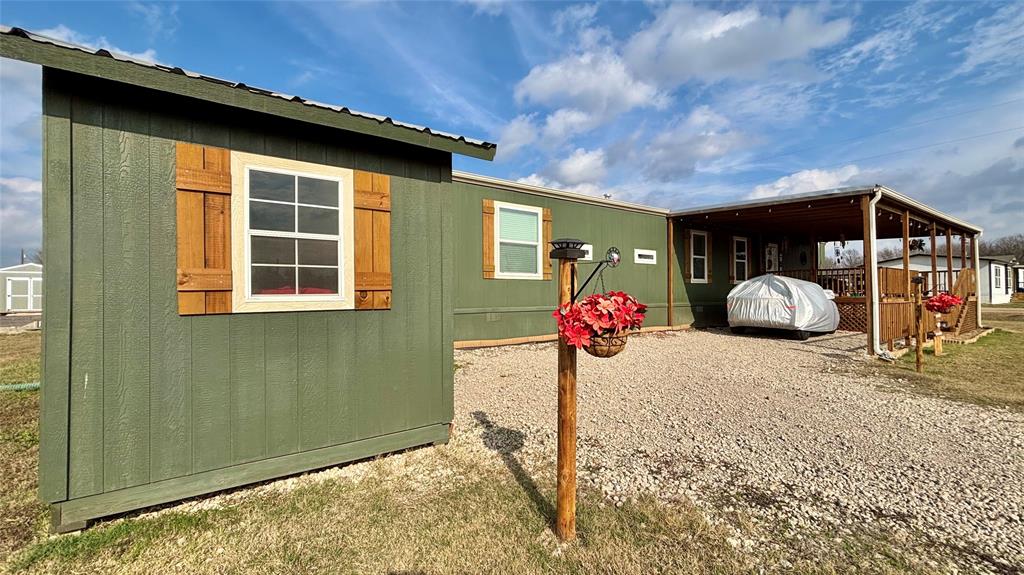 269 Apache Quitman, TX 75783 - Photo 2 of 40 a front view of a house with a yard