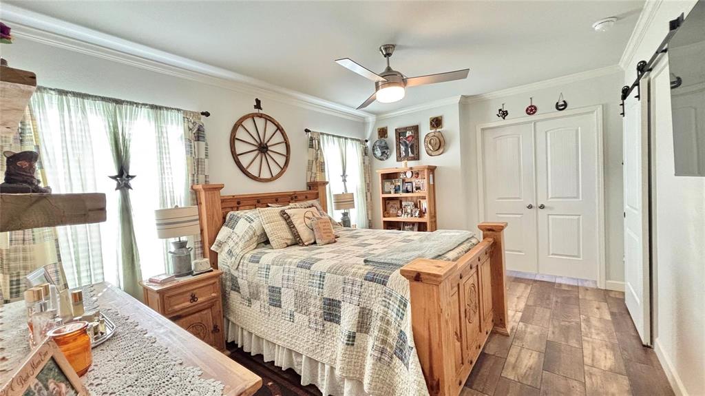 269 Apache Quitman, TX 75783 - Photo 21 of 40 a bedroom with a bed and a table with the outer view