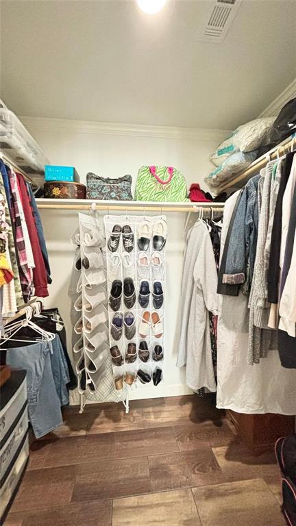 269 Apache Quitman, TX 75783 - Photo 25 of 40 a view of walk in closet with clothes and shoes