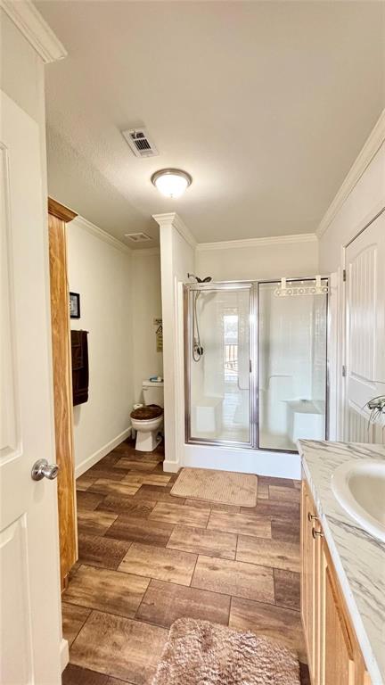 269 Apache Quitman, TX 75783 - Photo 10 of 40 a spacious bathroom with a granite countertop sink a mirror and a shower