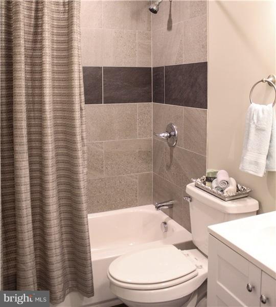 125 Bridle Path Road Front Royal, VA 22630 - Photo 4 of 6 a bathroom with a sink a toilet and shower