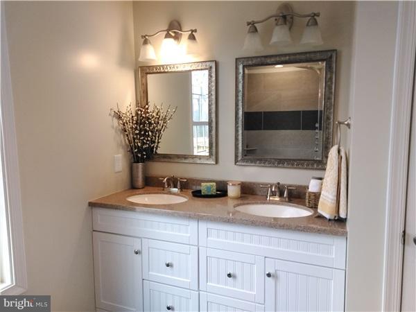 125 Bridle Path Road Front Royal, VA 22630 - Photo 5 of 6 a bathroom with a sink and a mirror