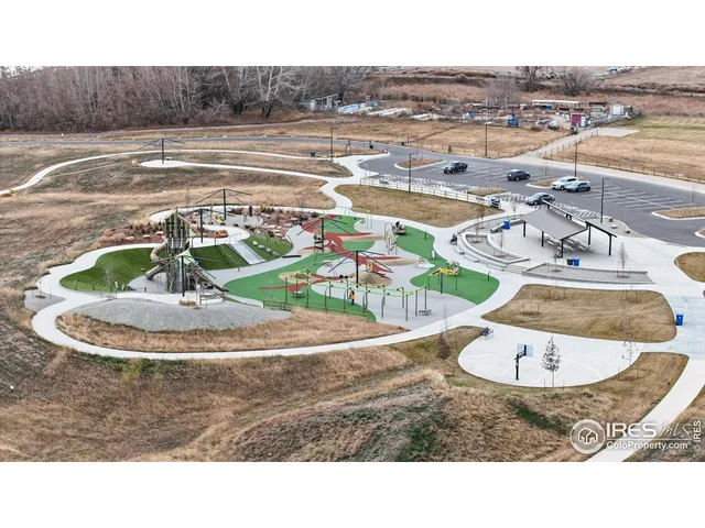 a view of a swimming pool with a yard