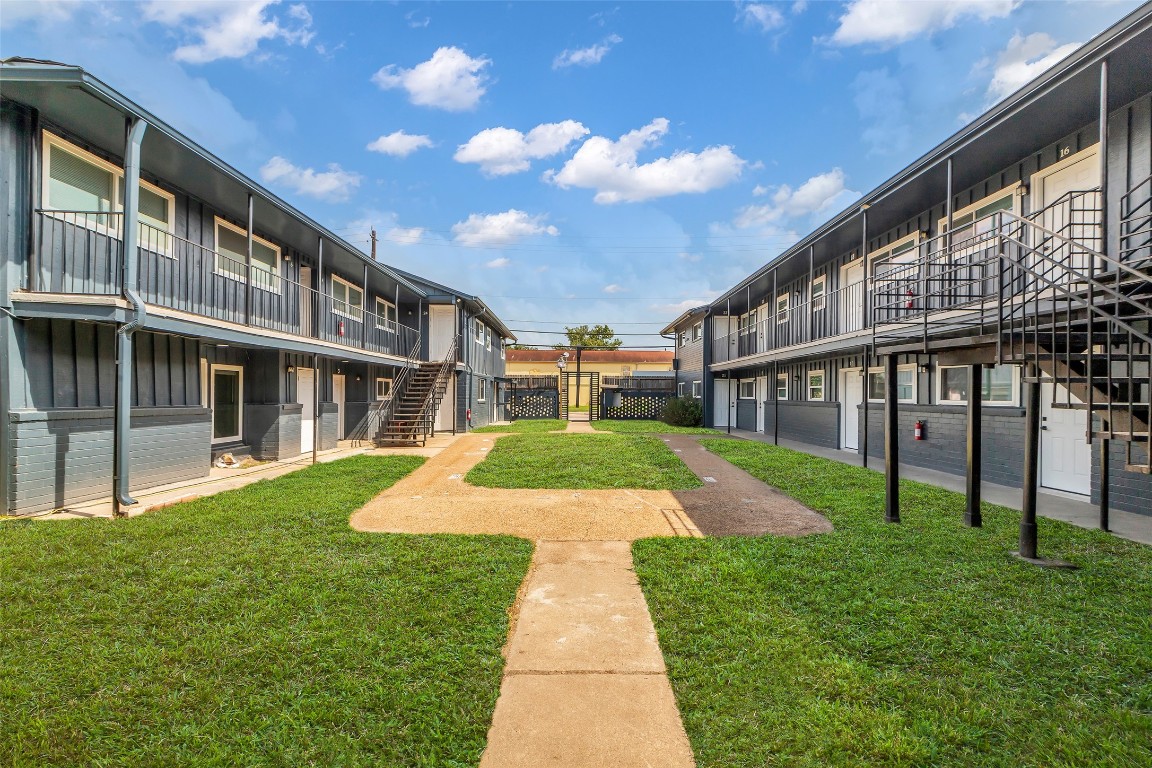 4706 Yellowstone Boulevard, Unit 11 Houston, TX 77021 - Photo 4 of 13 a view of house with a yard