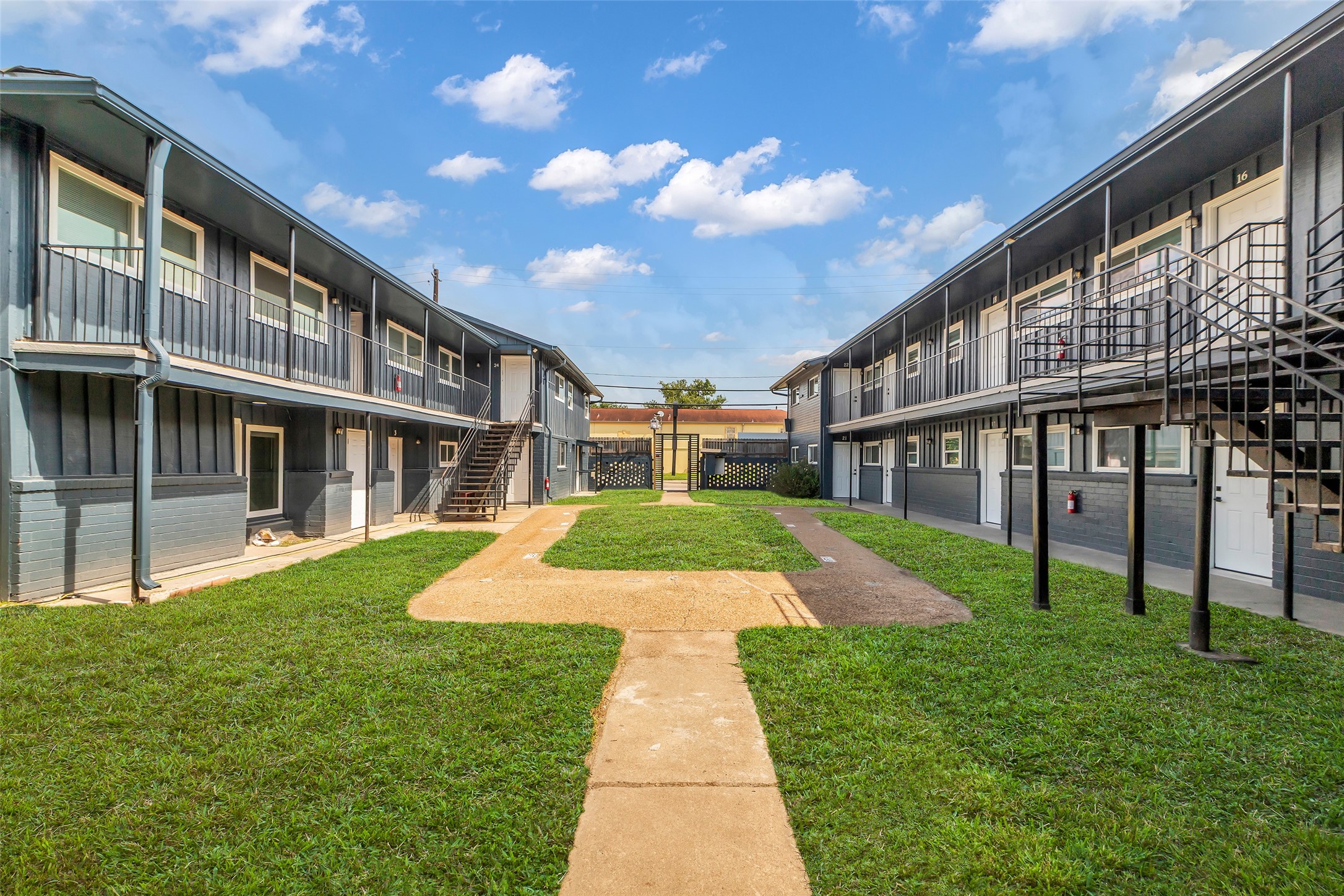 4706 Yellowstone Boulevard, Unit 11 Houston, TX 77021 - Photo 4 of 13 a view of house with a yard