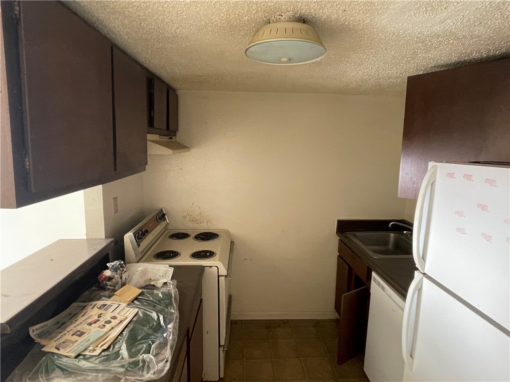 5900 Leonard Road Bryan, TX 77807 - Photo 23 of 27 a utility room with dryer and washer