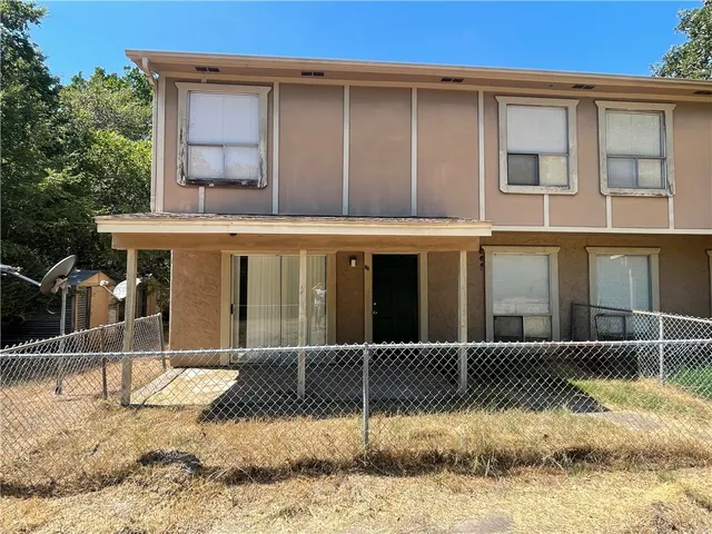 a front view of a house with a porch