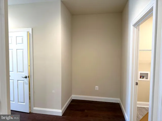 a kitchen with a sink and a large window