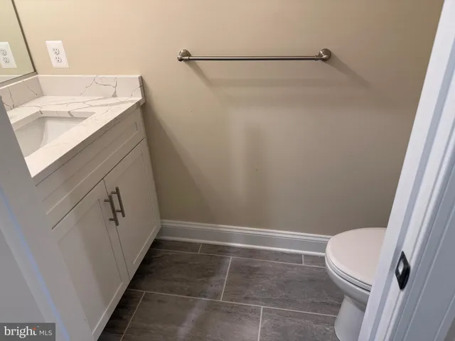 a kitchen with a stove and a sink