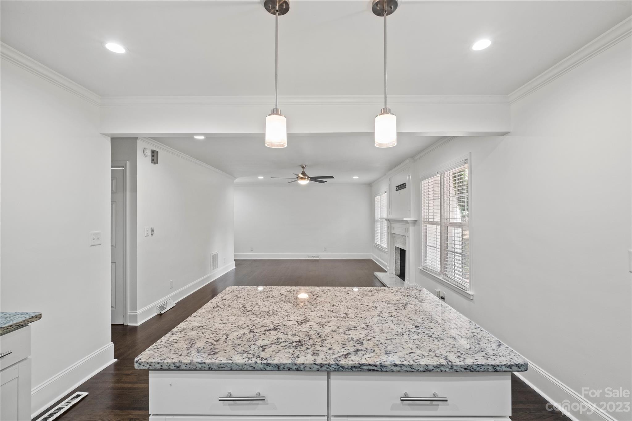 3522 Enfield Road Charlotte, NC 28205 - Photo 11 of 32 a view of a kitchen and kitchen island
