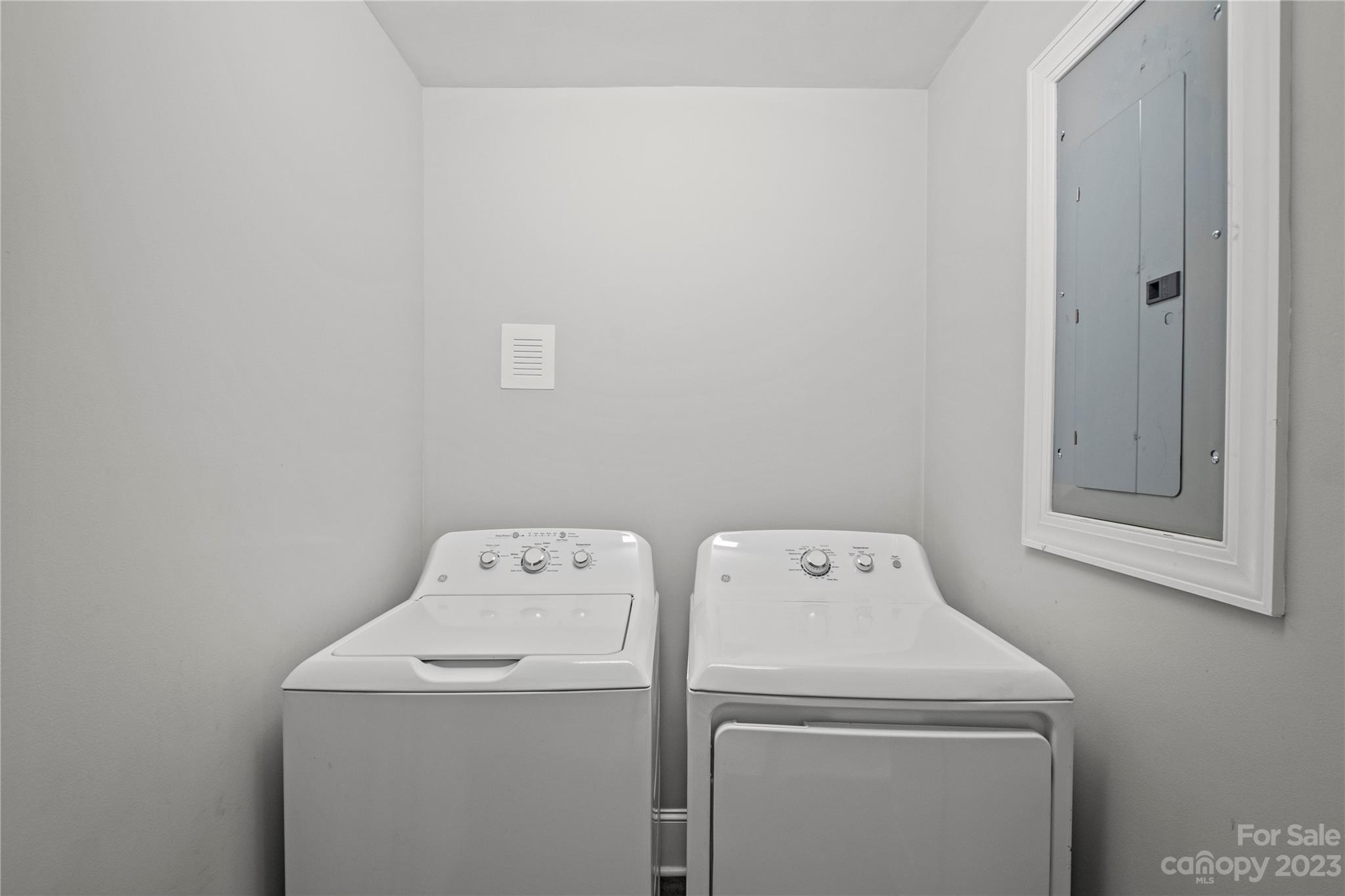 3522 Enfield Road Charlotte, NC 28205 - Photo 12 of 32 a utility room with dryer and washer