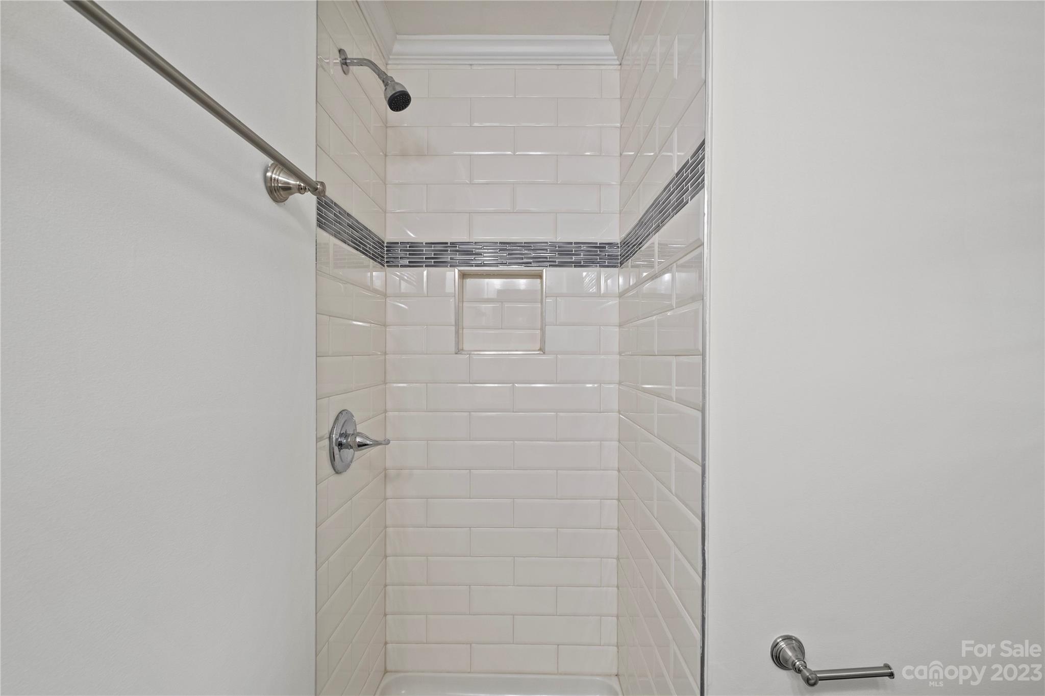 3522 Enfield Road Charlotte, NC 28205 - Photo 16 of 32 a bathroom with a shower