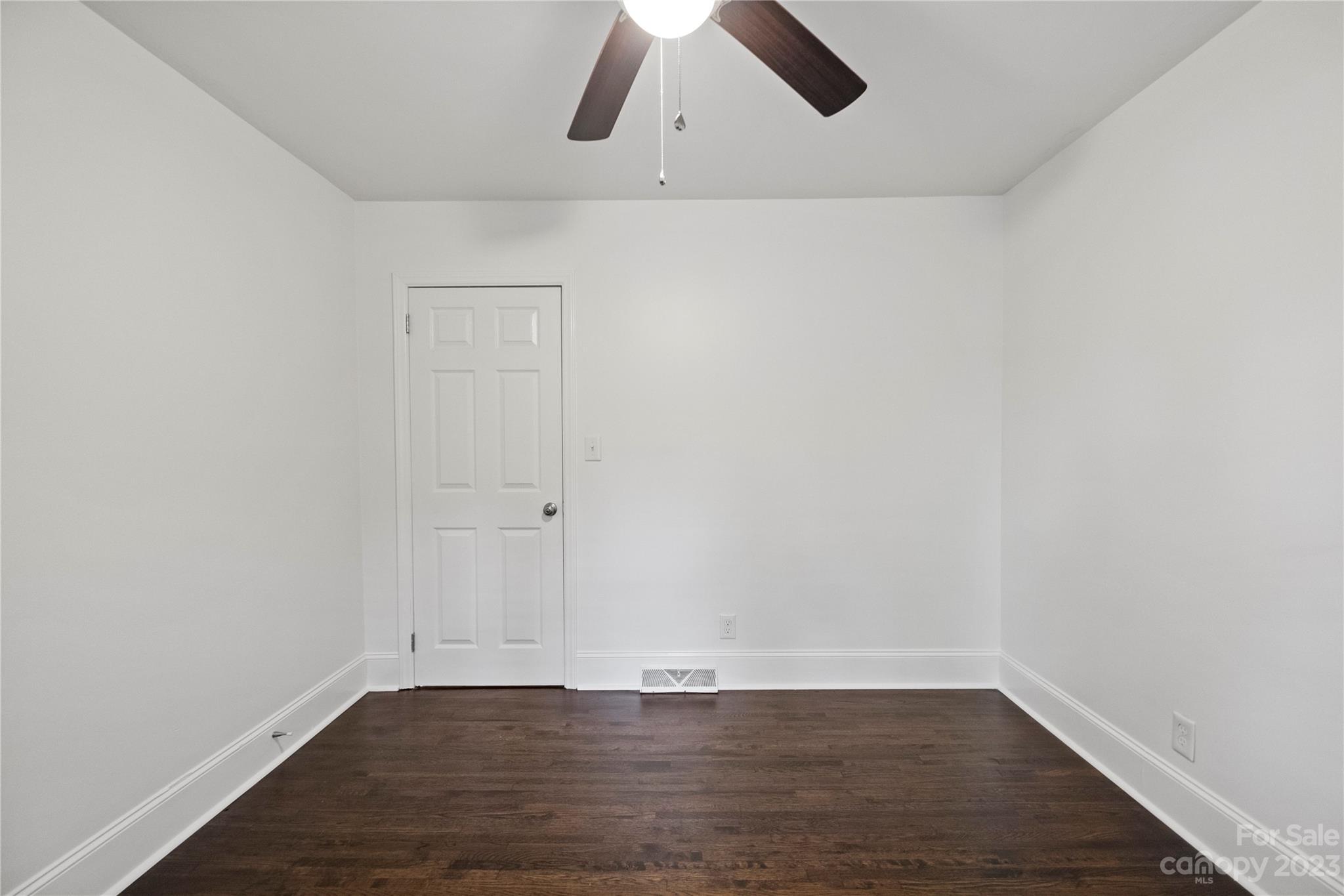 3522 Enfield Road Charlotte, NC 28205 - Photo 18 of 32 a view of an empty room with wooden floor