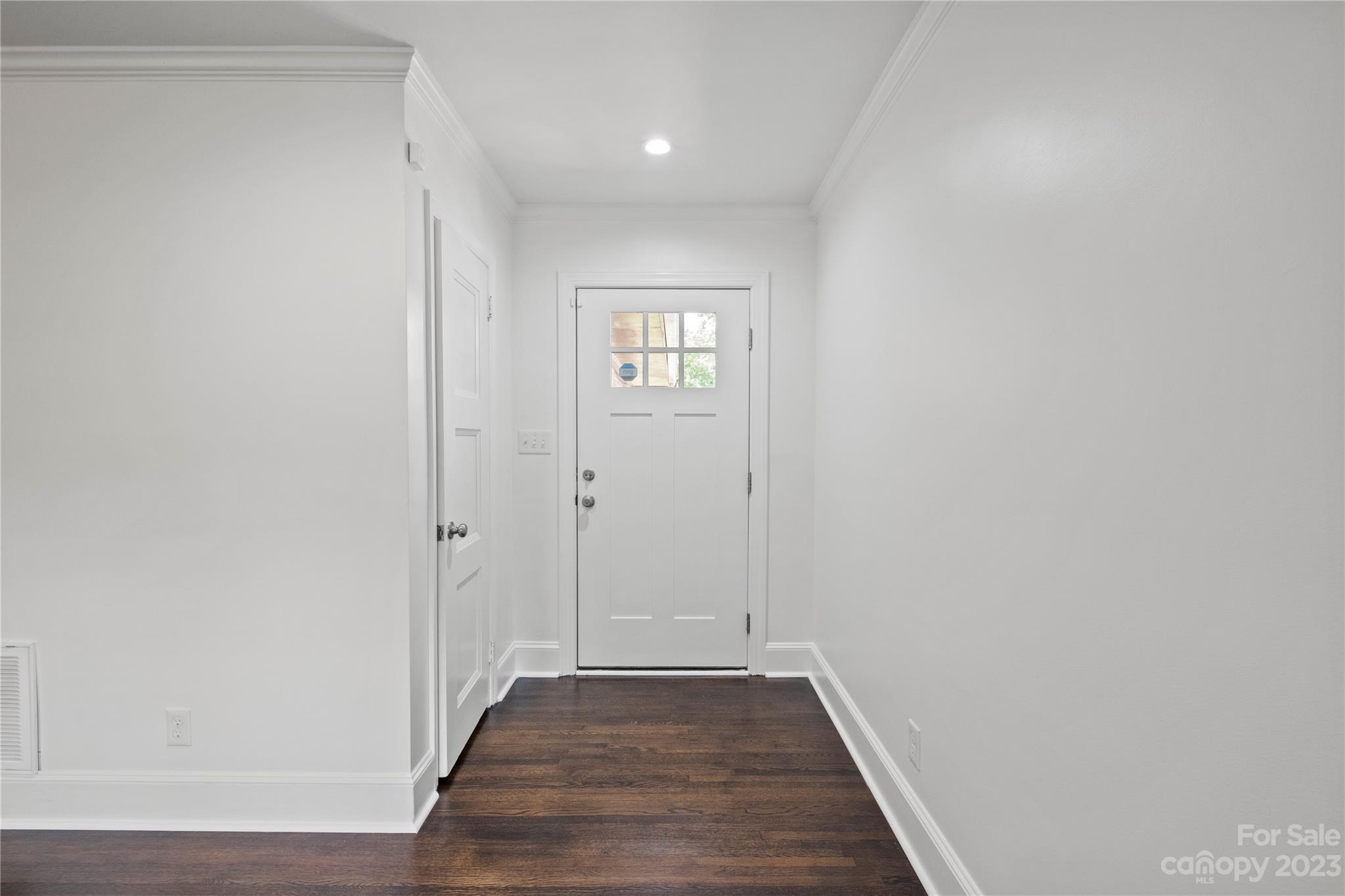 3522 Enfield Road Charlotte, NC 28205 - Photo 2 of 32 a view of an empty room and wooden floor