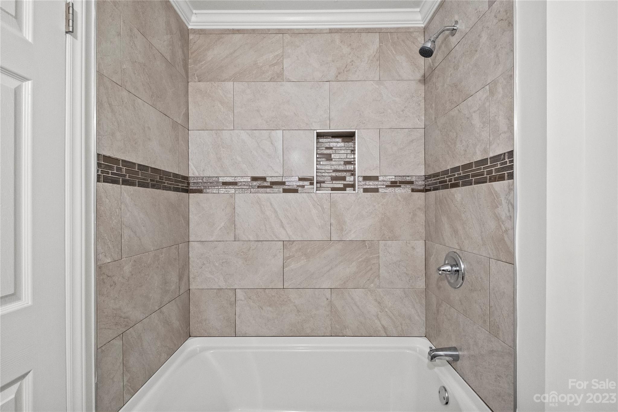 3522 Enfield Road Charlotte, NC 28205 - Photo 22 of 32 a bathroom with a shower