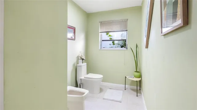 a living room with lots of furniture and a rug