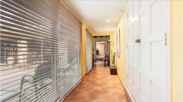 a view of a livingroom with furniture and a table