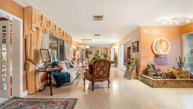 a kitchen with stainless steel appliances granite countertop a sink dishwasher stove and refrigerator