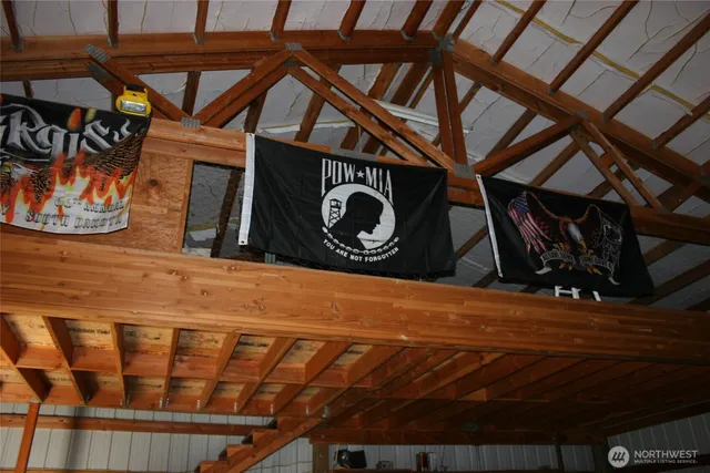 a view of parking garage with cars