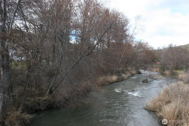 a view of a refrigerator in a white wall