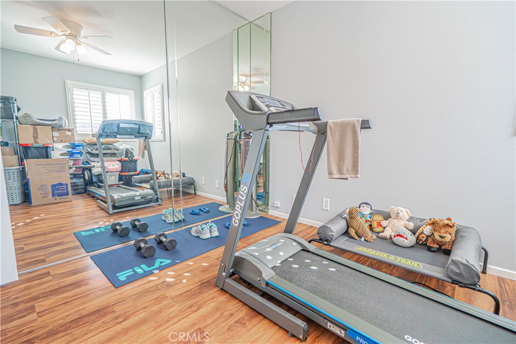 27738 Hyssop Lane Saugus, CA 91350 - Photo 26 of 43 a living room with furniture and a wooden floor