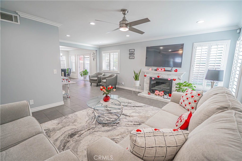 27738 Hyssop Lane Saugus, CA 91350 - Photo 8 of 43 a bed room with a bed couch and a window