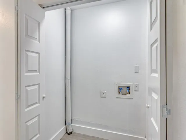 a house with trees in front of it