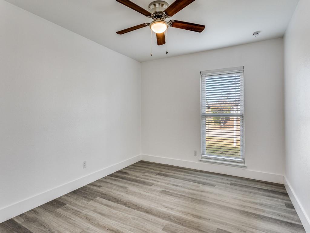 3821 Horizon Place Fort Worth, TX 76133 - Photo 8 of 19 wooden floor in an empty room with a window
