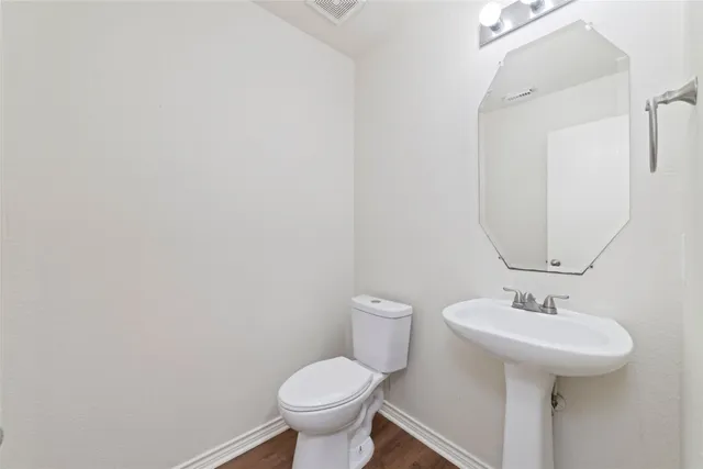 a bathroom with a sink and a toilet