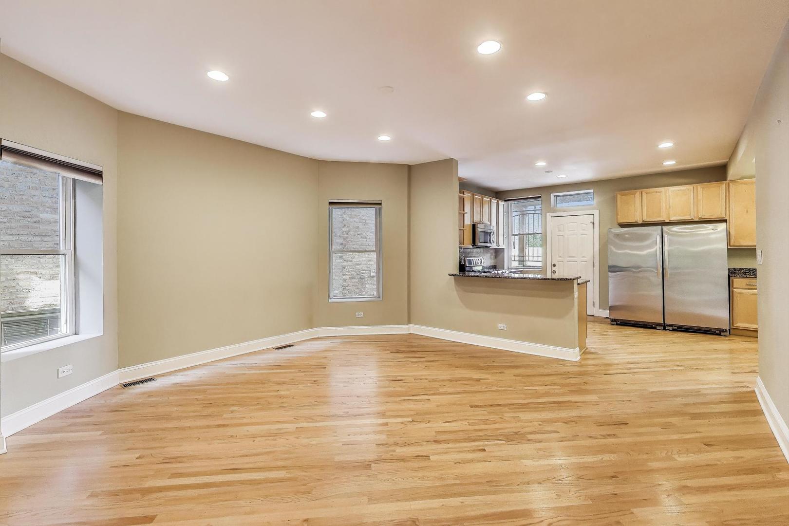 7730 North Paulina Street, Unit 1 Chicago, IL 60626 - Photo 18 of 59 a view of an empty room with a window