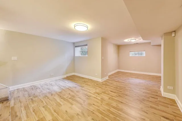 a living room with a couch and a painting on the wall