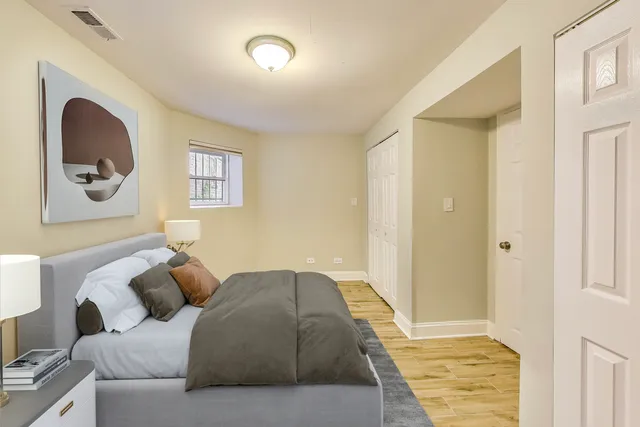 a view of entryway with wooden floor and fence