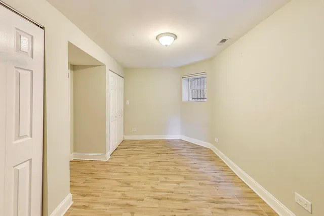 a view of a bunch of flowers in back yard